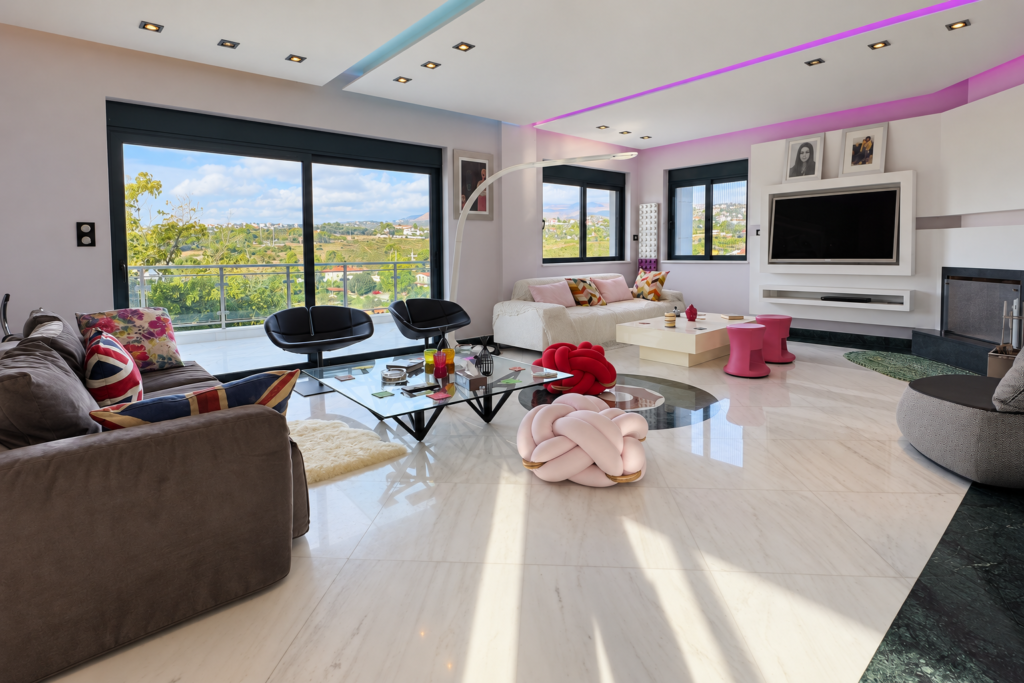 Smart Lighting in the Living Room Living room with television, fireplace and coloured cove lighting