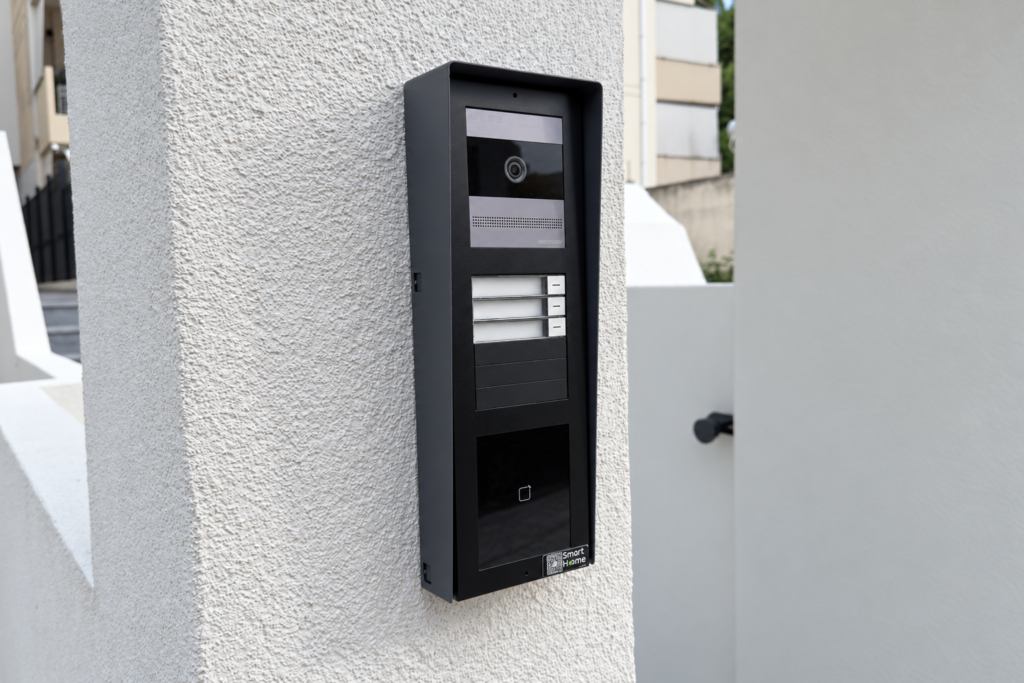 Outdoor video intercom panel serving three homes Outdoor video intercom panel serving three homes