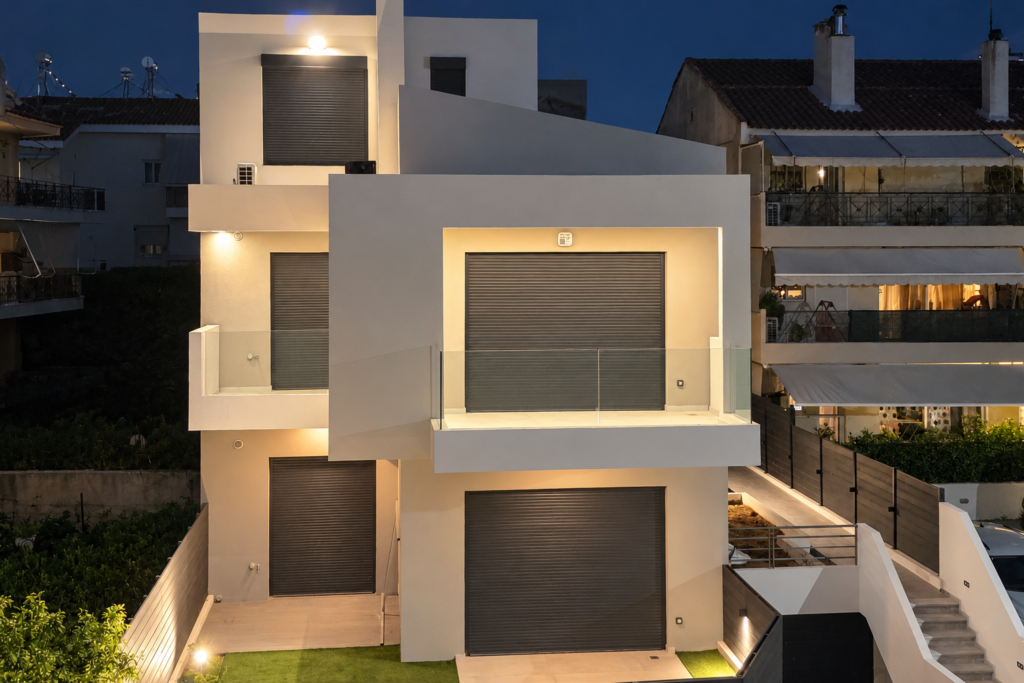 Night view of the building containing three maisonettes Night view of the building containing three maisonettes