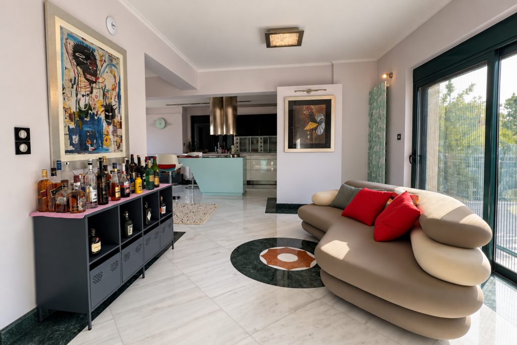 Smart Home Living Room and Kitchen Living area with sofa and open kitchen in the smart residence