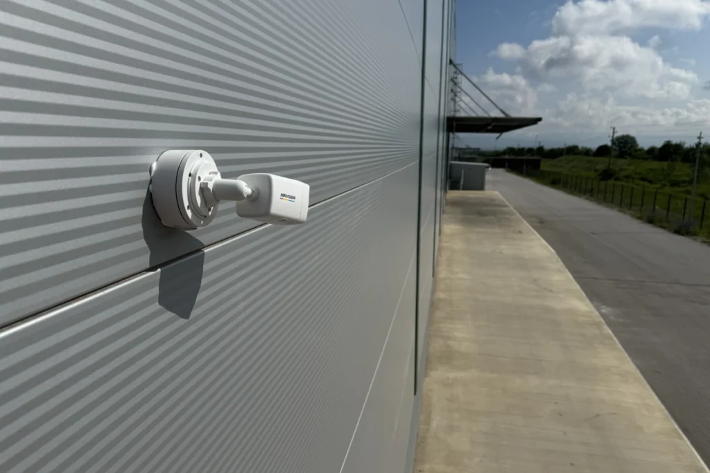Exterior camera along the warehouse wall Exterior camera along the warehouse wall
